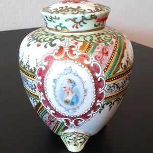 Antique decorative jar with lid